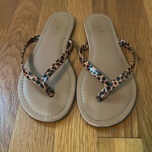 J. Crew, tortoise flip flops. Size 7.